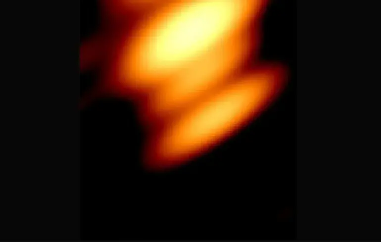 Чорні діри, які обертаються навколо одна одної - вчені вперше зробили знімок подвійної чорної діри - фото 1