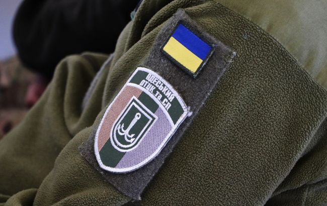 В Одесі на працівників ТЦК напали вантажники біля ринку 7-й кілометр - побили й перевернули авто 1